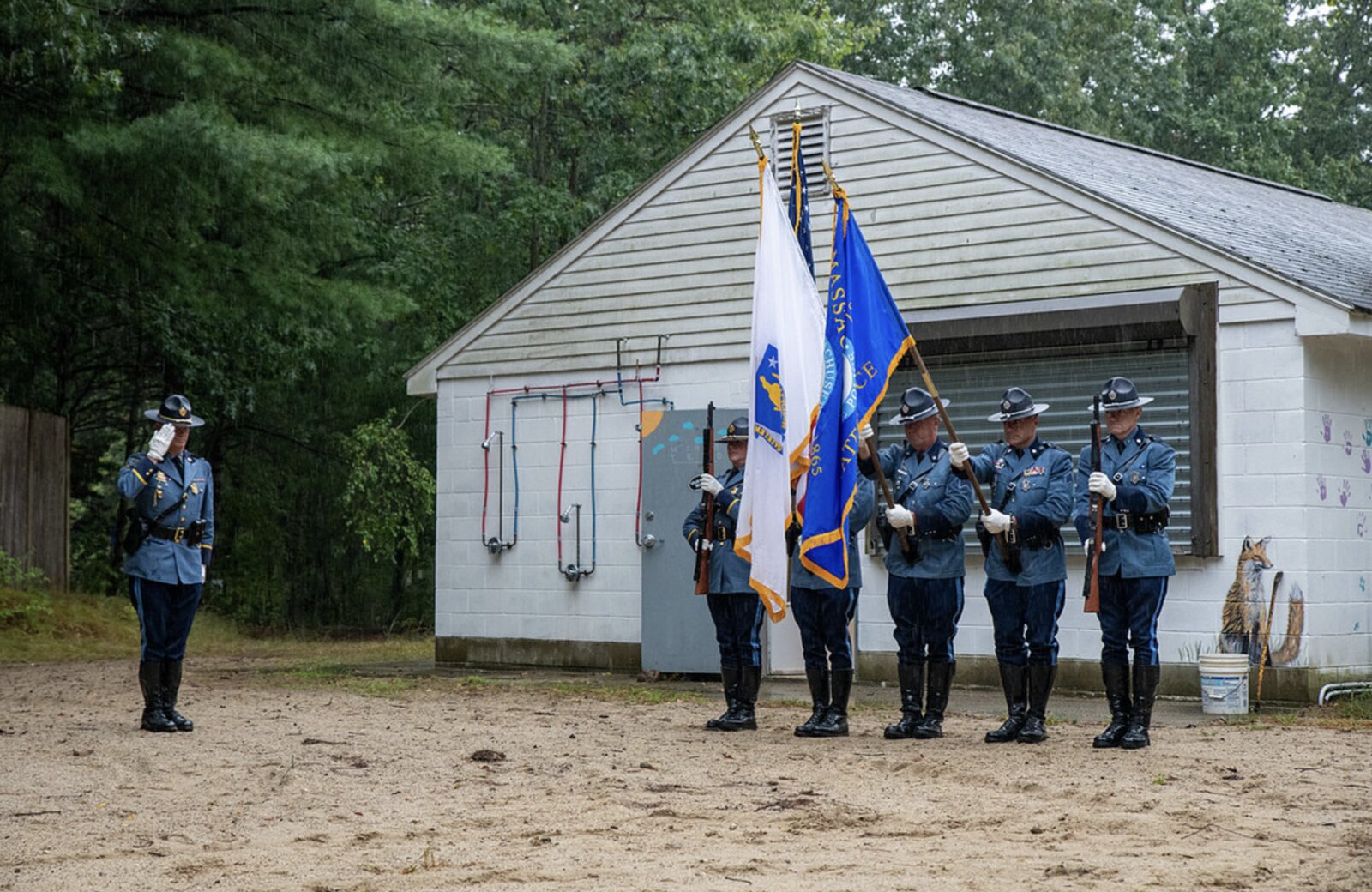 Massachusetts State Police Honor Guard presenting colors in memory of Captain Richard J. Cashin at Boxford Town Beach